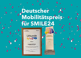 Urkunde und Mobilitätspreis mit Konfetti
