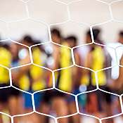 ThinkstockPhotos-540234034.jpg undeutliche Sportmannschaft durch Netz